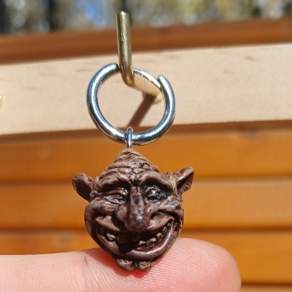 Troll face earring